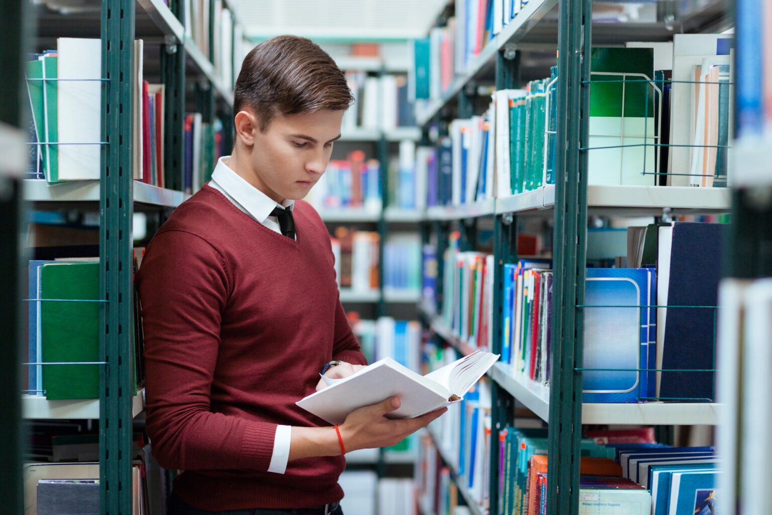 student-searching-book-in-university-library.jpg