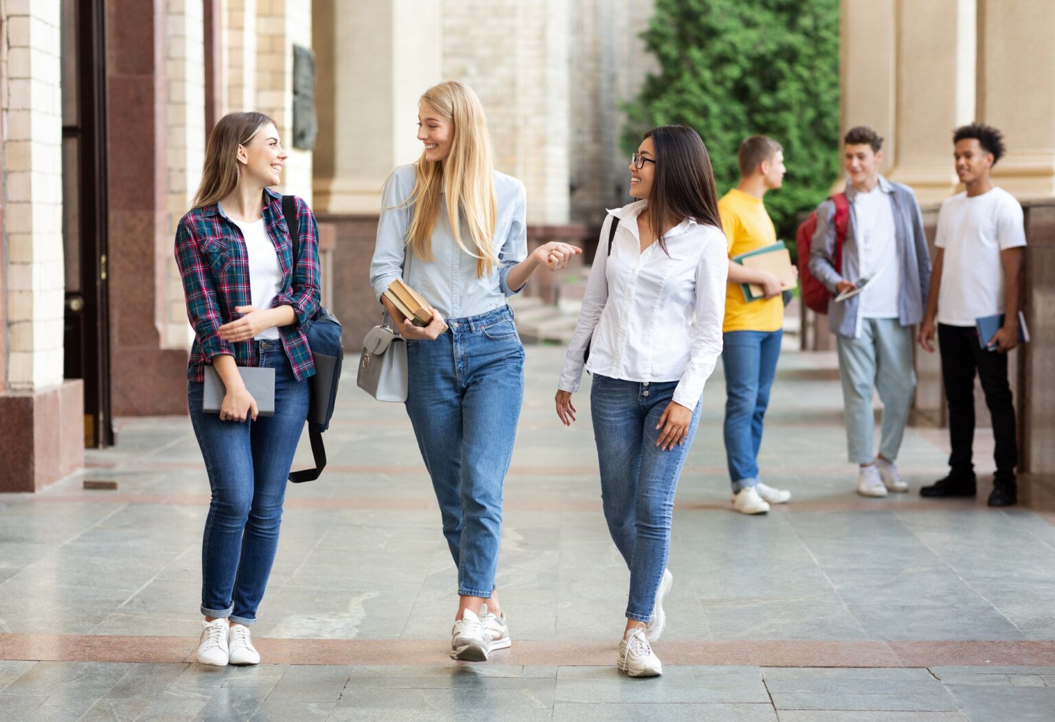 university-life-girls-walking-after-classes-outdoors.jpg