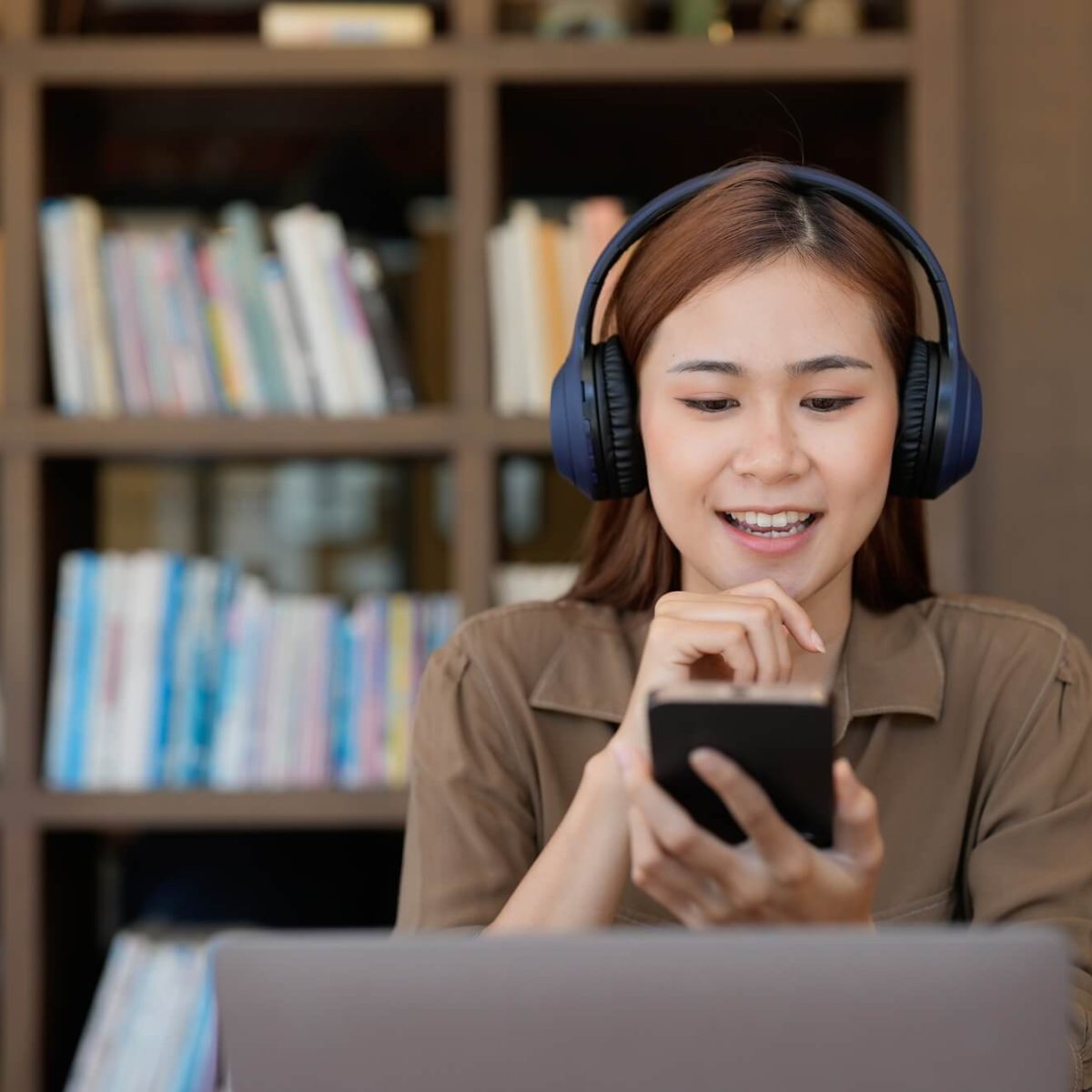 asian-tutor-of-language-start-online-lesson-with-trainee-wave-hand-smiling-looks-at-pc-screen.jpg